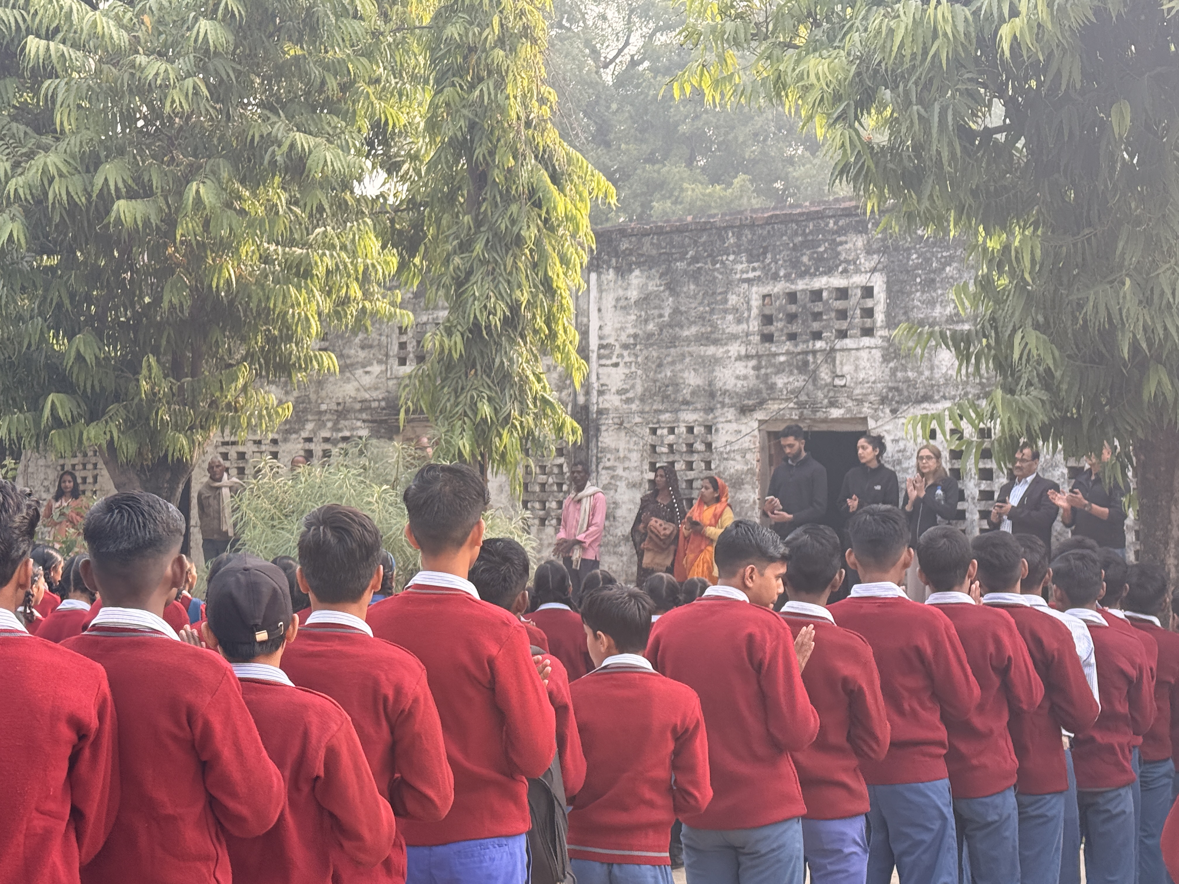 Morning mist over the school grounds as students arrive